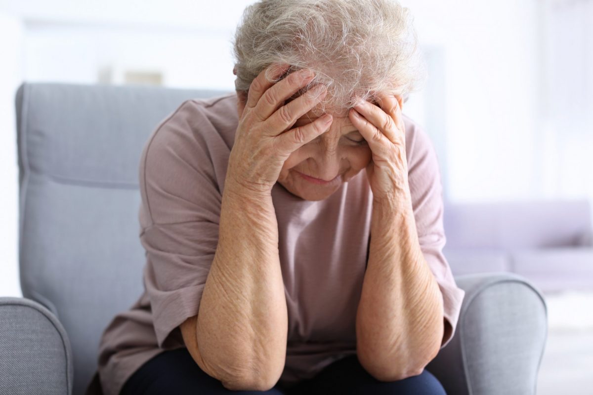 Elderly woman crying